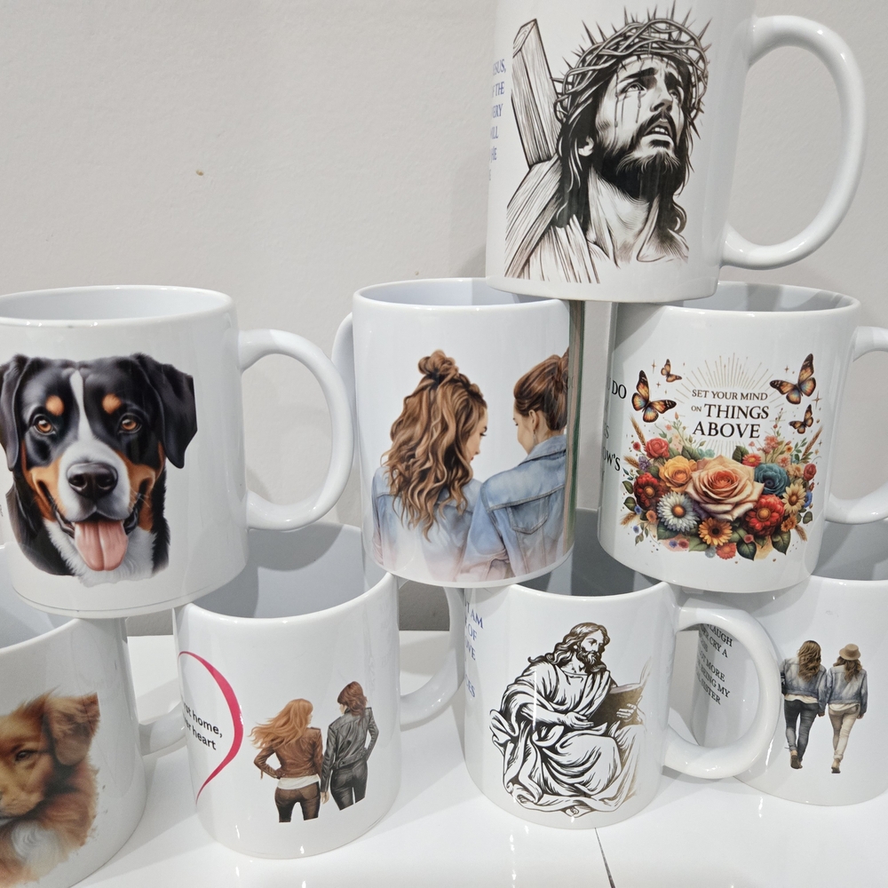White Ceramic Mug Set with Artistic Designs